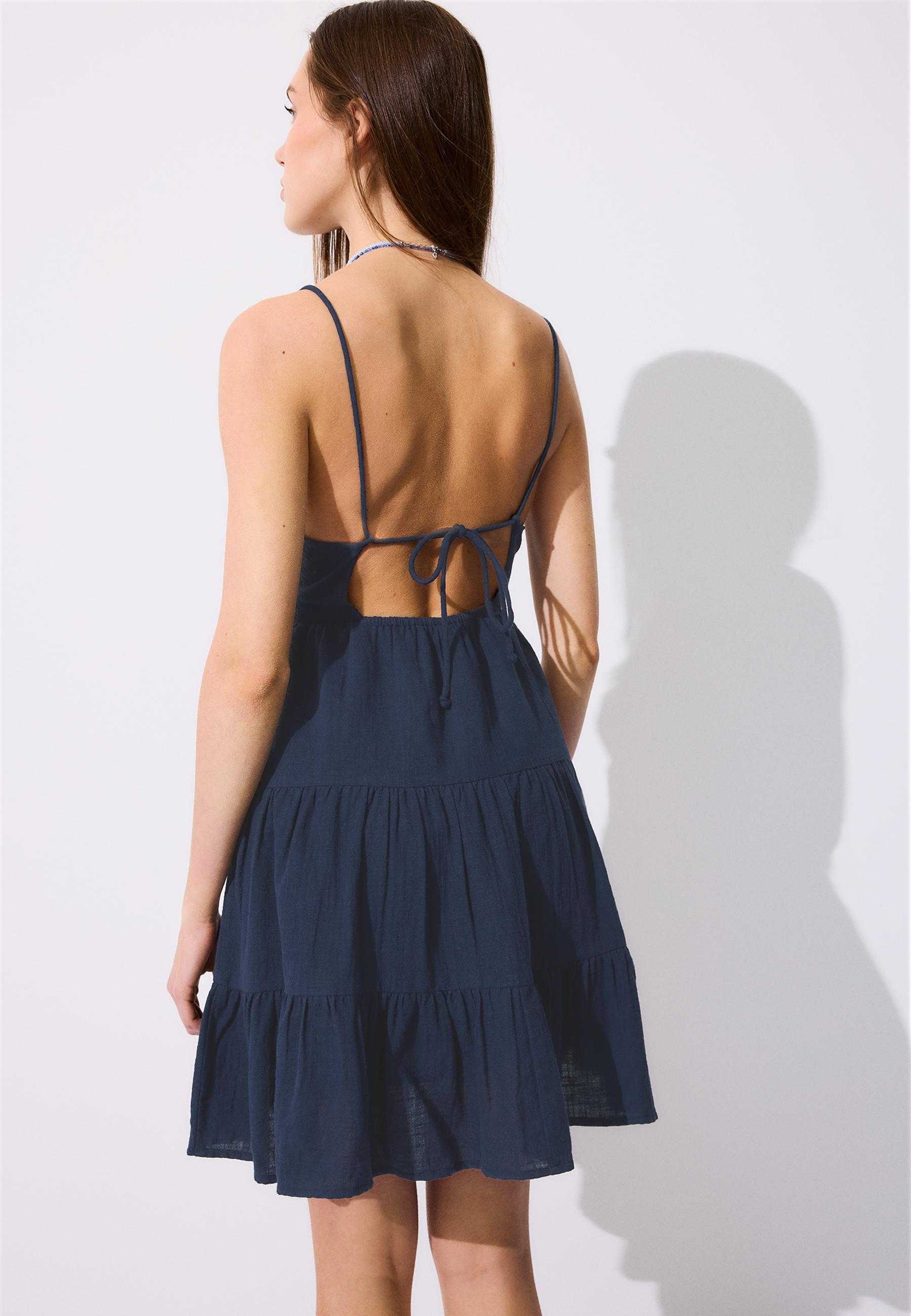 Short dress with shimmery detail and open back — Dark blue