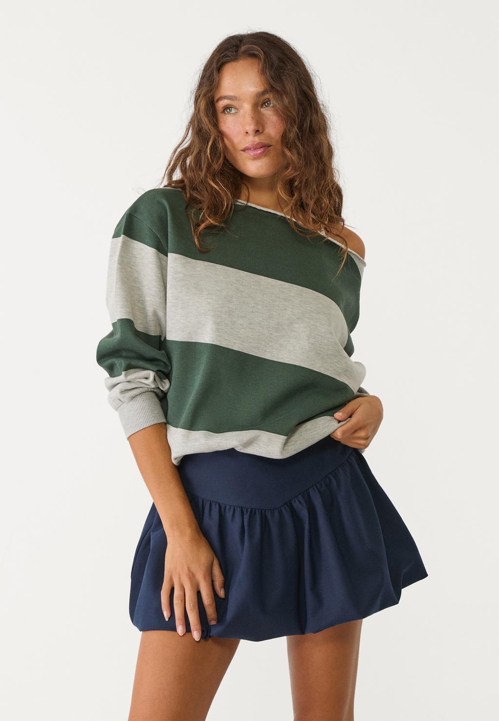 Striped sweatshirt with exposed shoulders