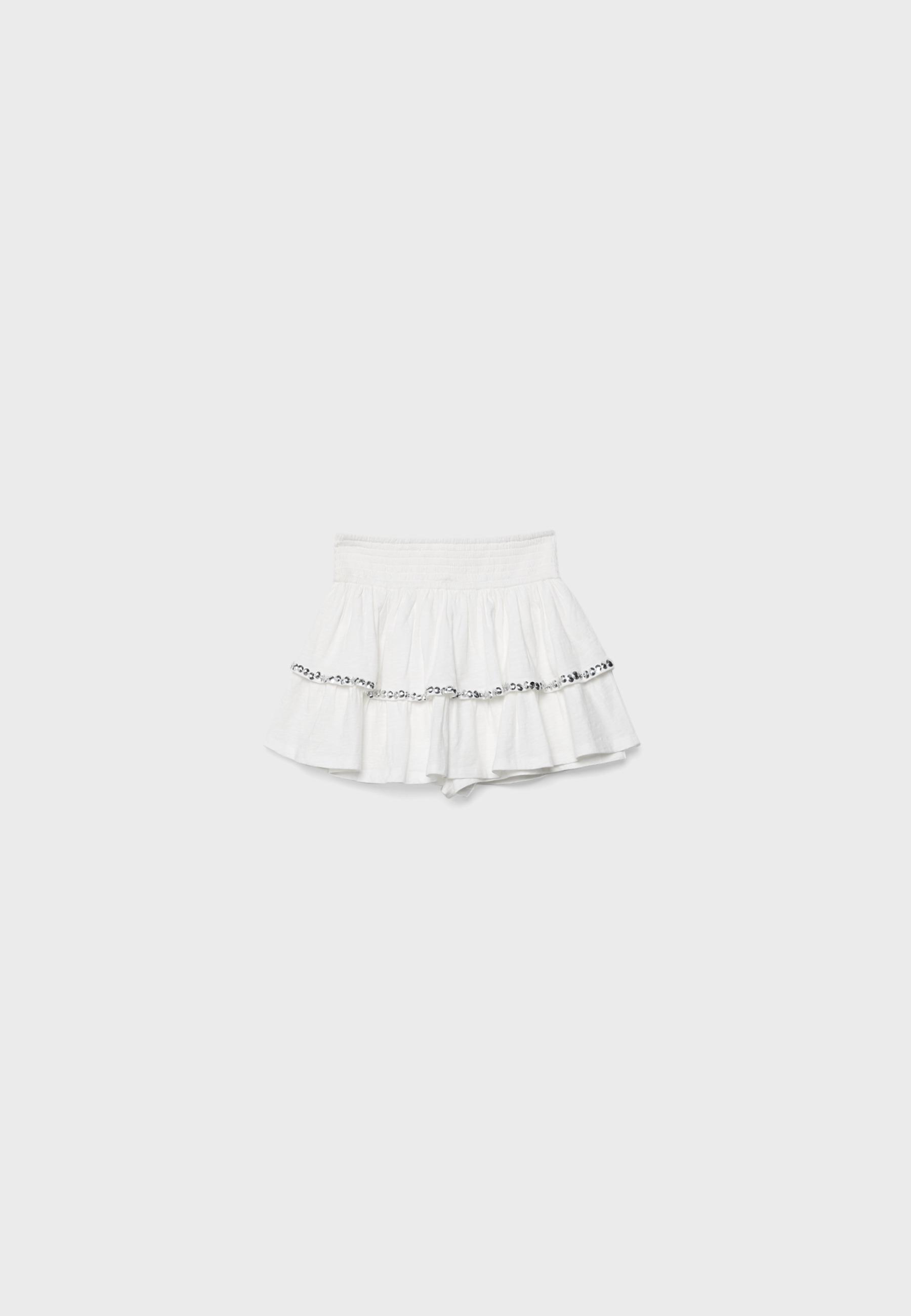 Studded ruffled mini skirt — Ecru