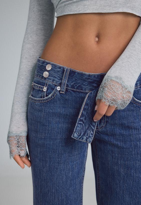 lowwaist wide leg jeans met hamerstijl tailleband