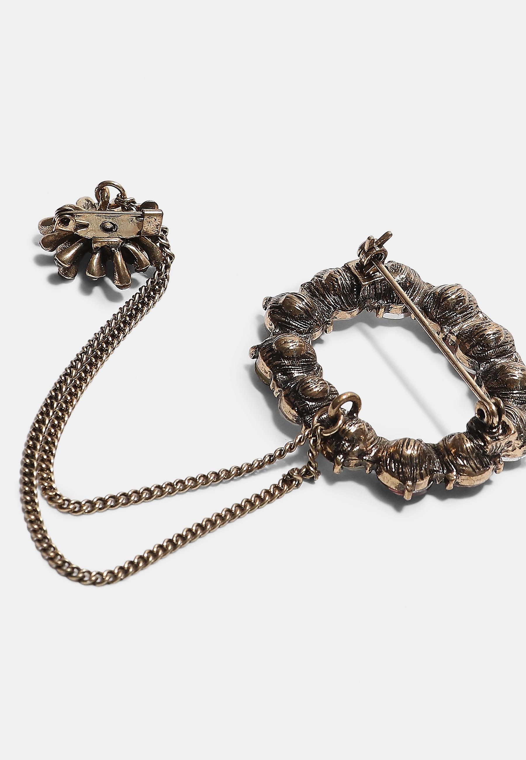 Jewelled chain brooch — Gold