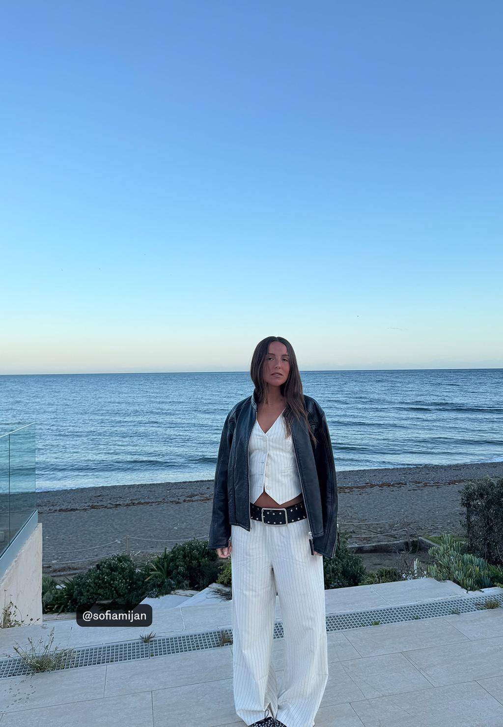 Gilet corto a righe bottoni