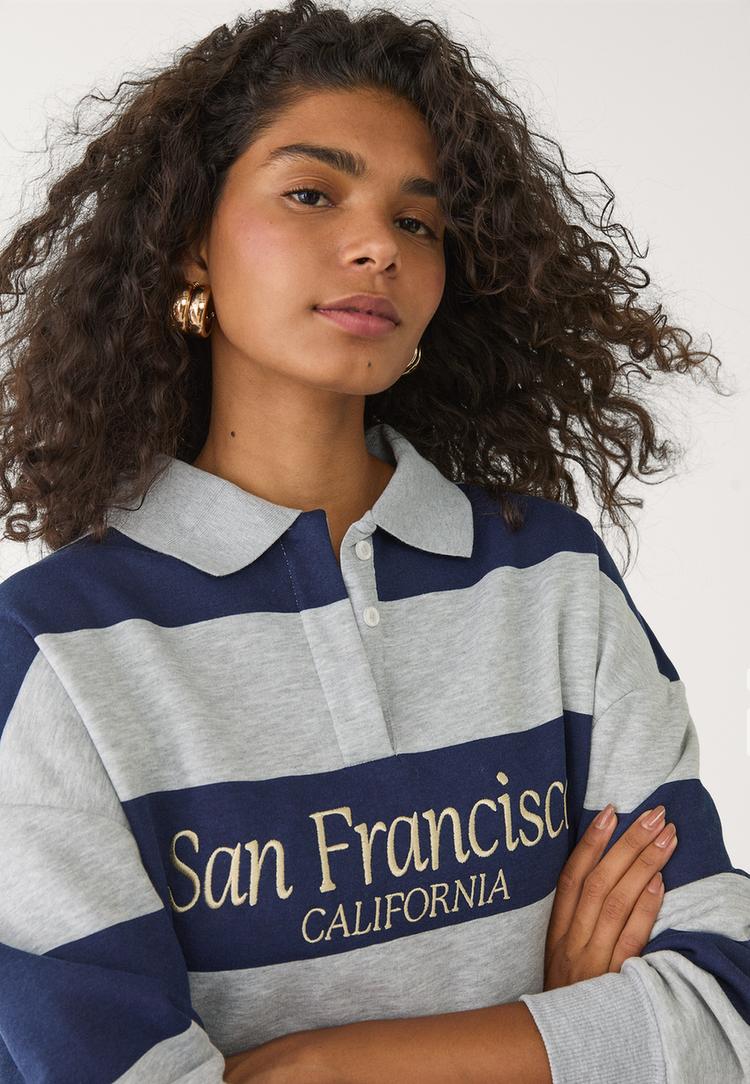 sudadera polo rayas bordados