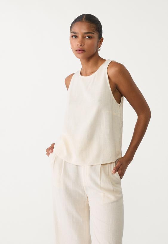 top nadadora fluido con lino