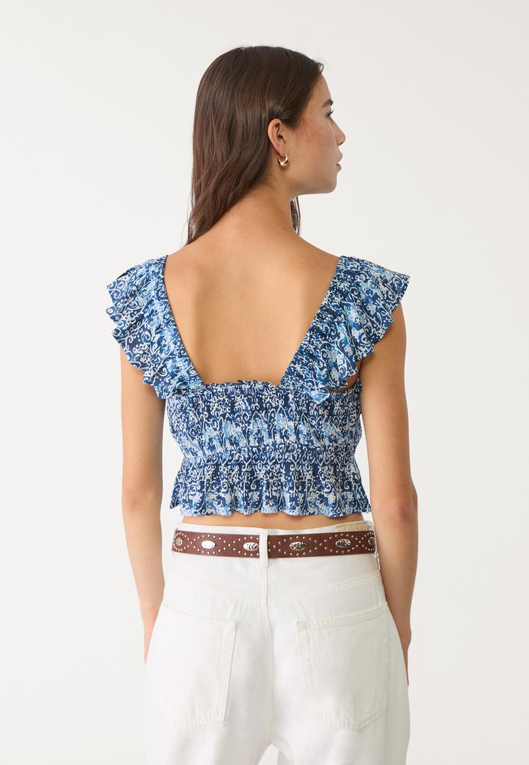 top fluido volantes estampado