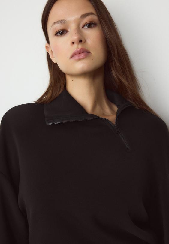 soft touch sweater met zijrits