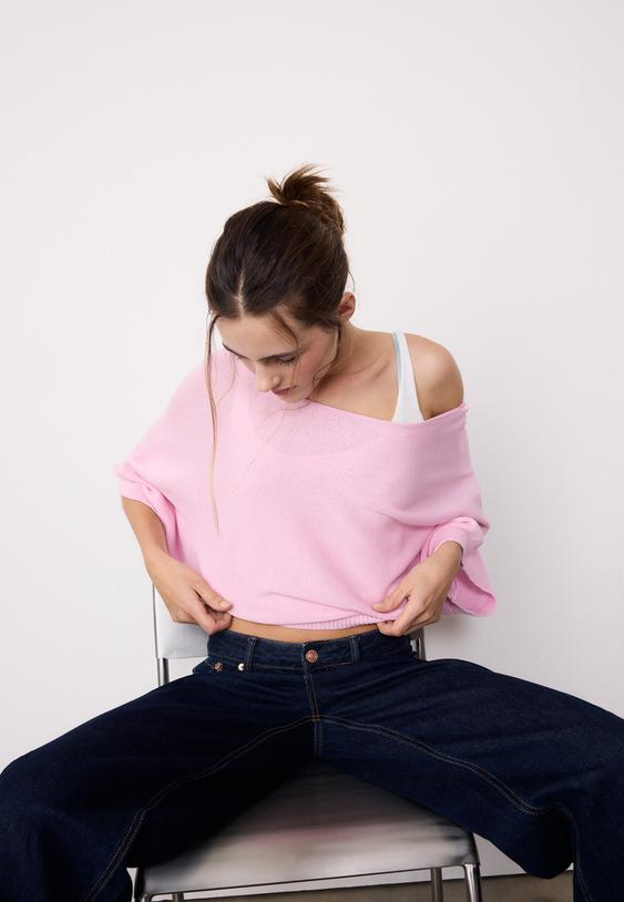 maglia a barchetta con sovrapposizione