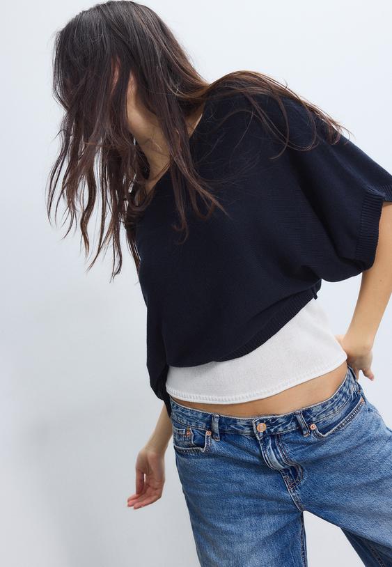 maglia a barchetta con sovrapposizione