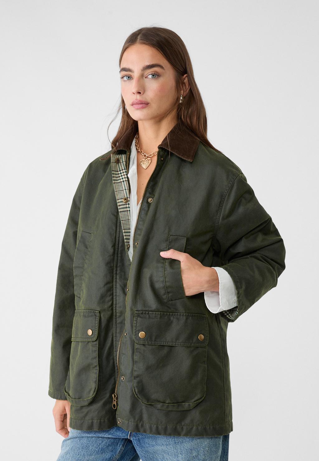 Waxed parka with multiple pockets