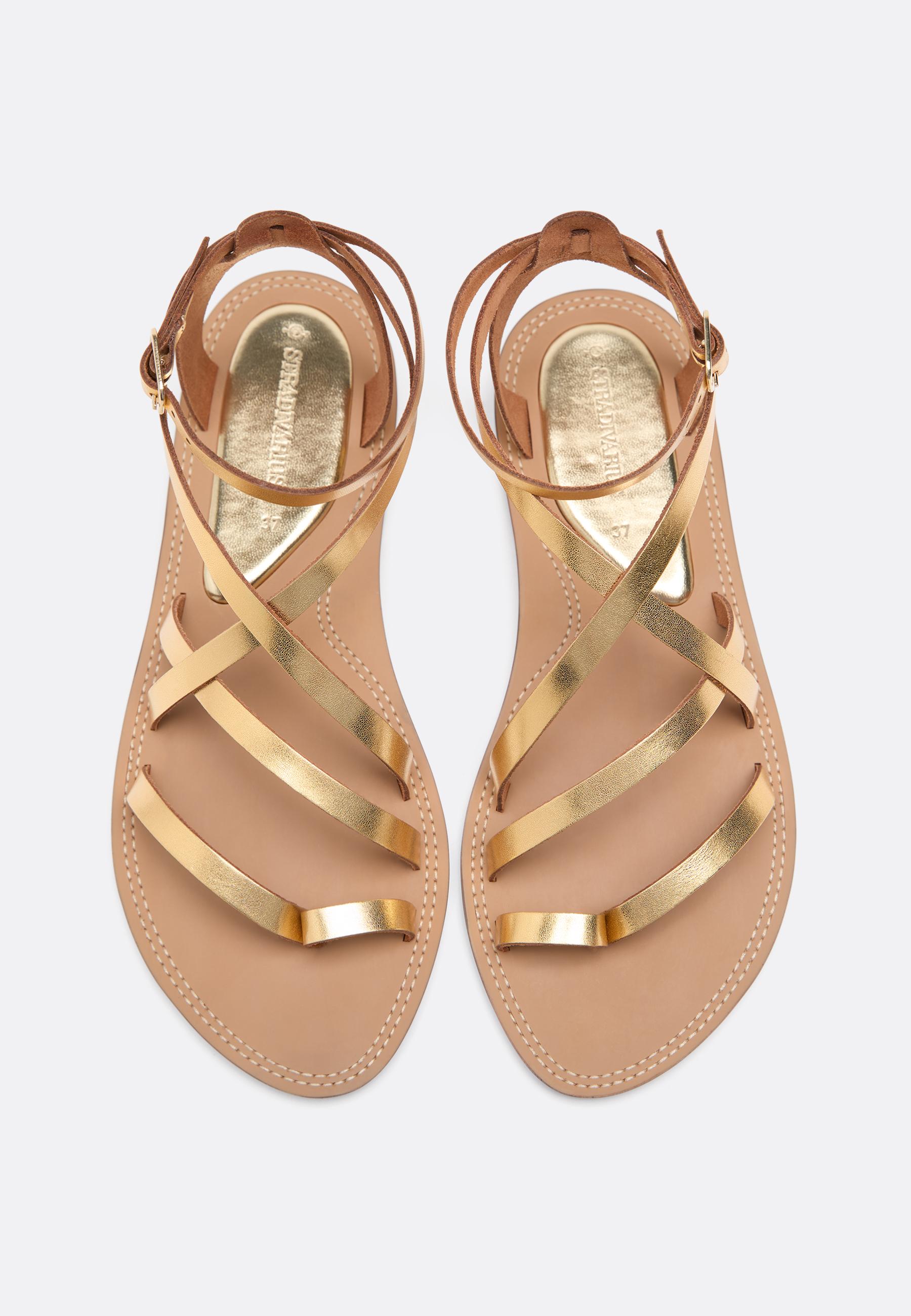 Flat leather tie-up sandals — GOLD