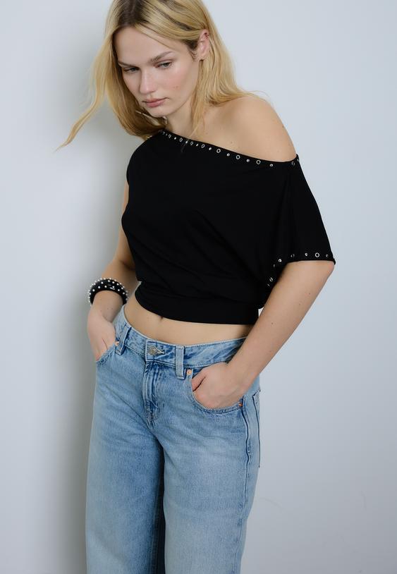 maglietta asimmetrica borchie