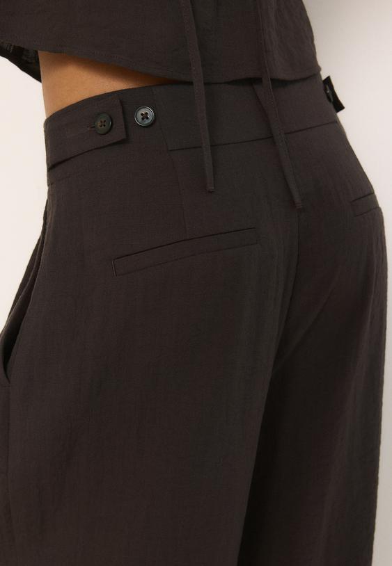 pantaloni ampi con bottoni regolabili misto lino