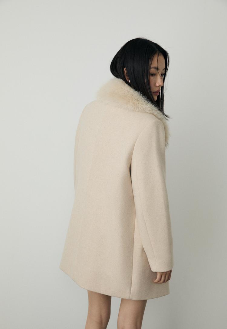 casaco gola com efeito de