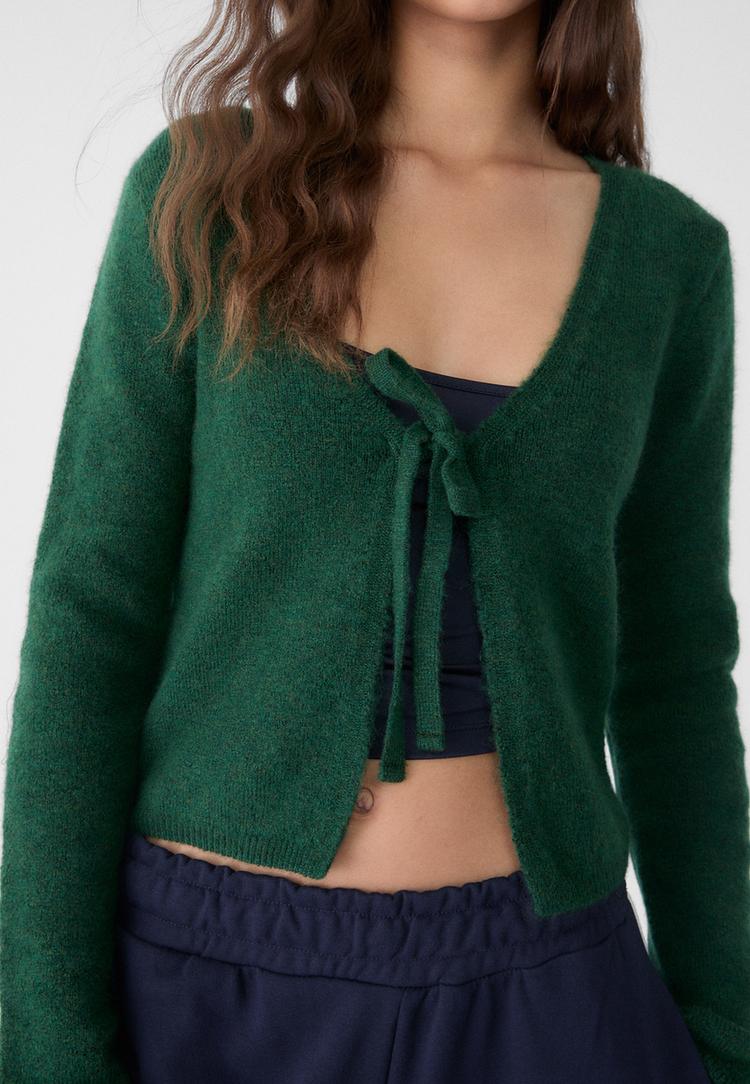 chaqueta punto lazada