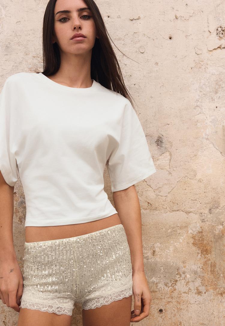 shorts-mit-pailletten-und-spitze