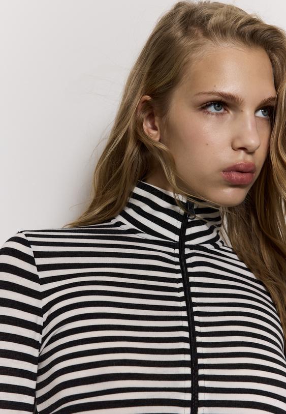 camiseta cremallera doble