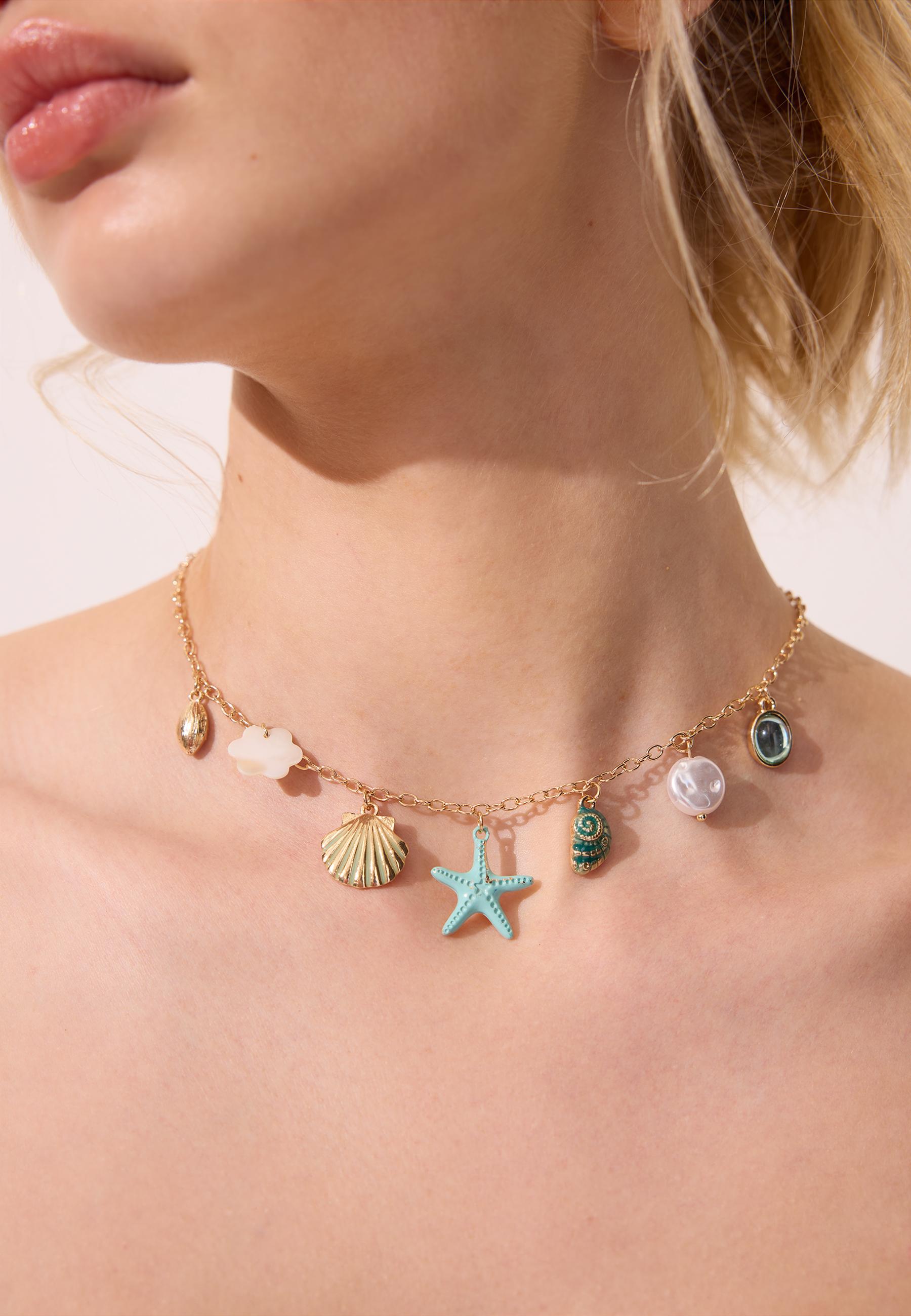 Set of 3 multi-charm sea necklaces — Gold