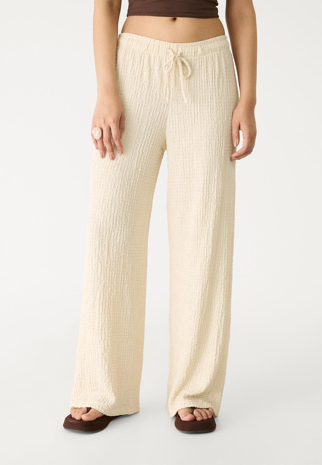 Pantalón largo fluido textura