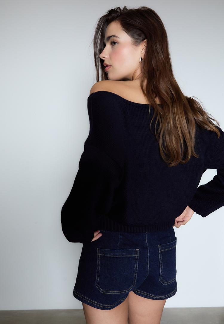 asymmetric knit sweater with star