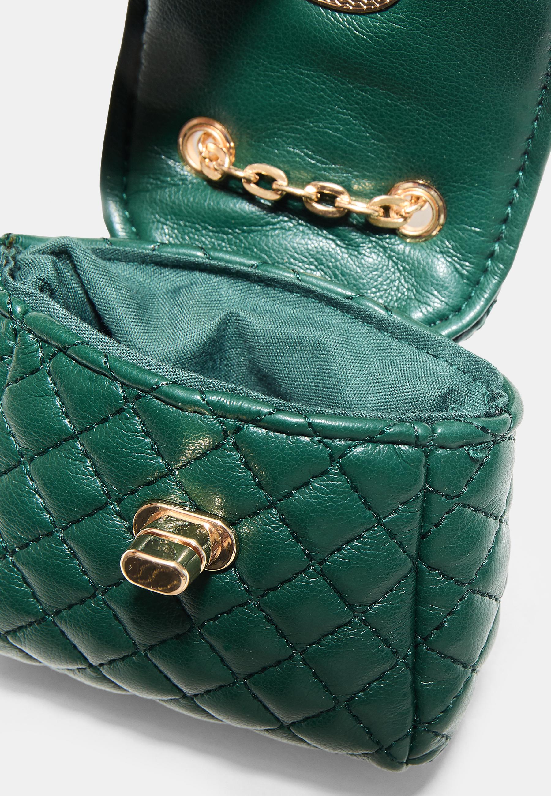 Quilted charm mini bag — Bottle green
