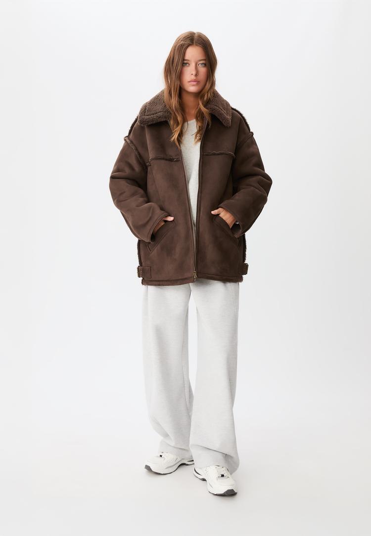 dubbelzijdige jas met stiksels