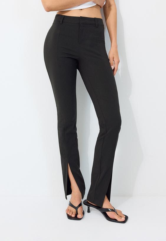 pantaloni in bengalina con spacchi