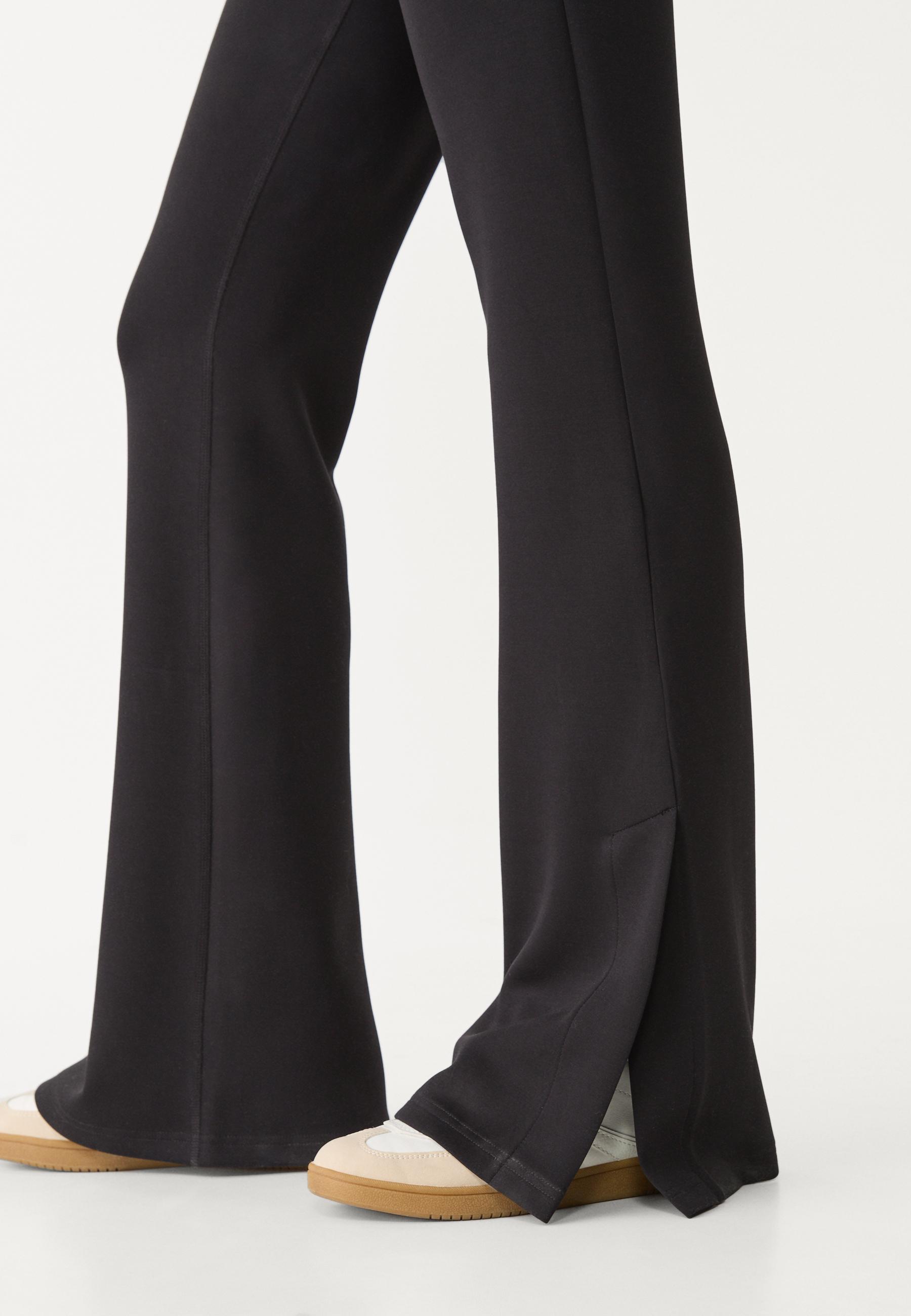 Soft-touch bell bottom trousers — Black