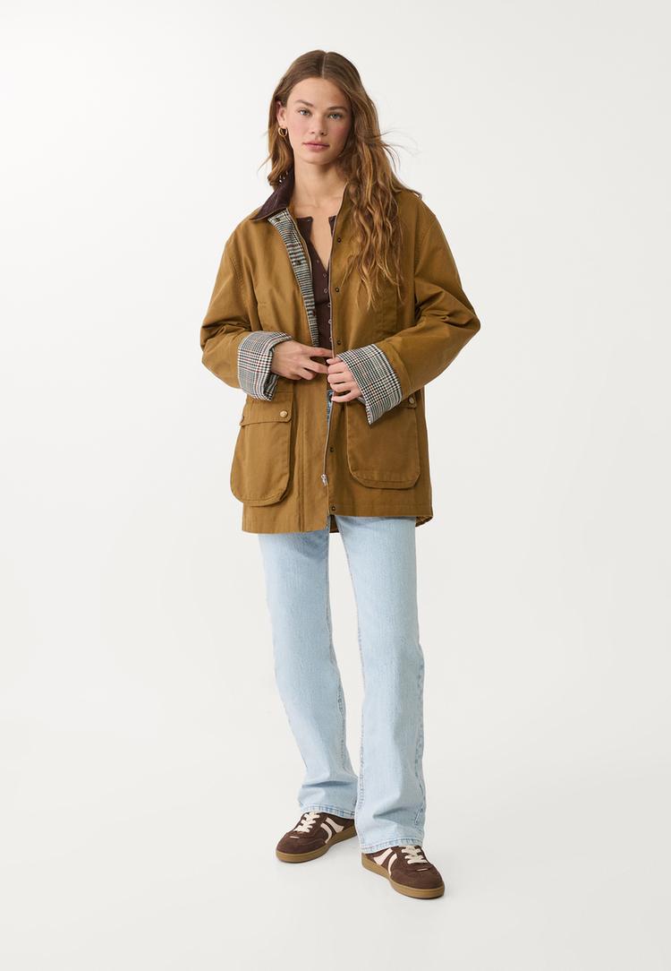 parka encerada multi bolsillos