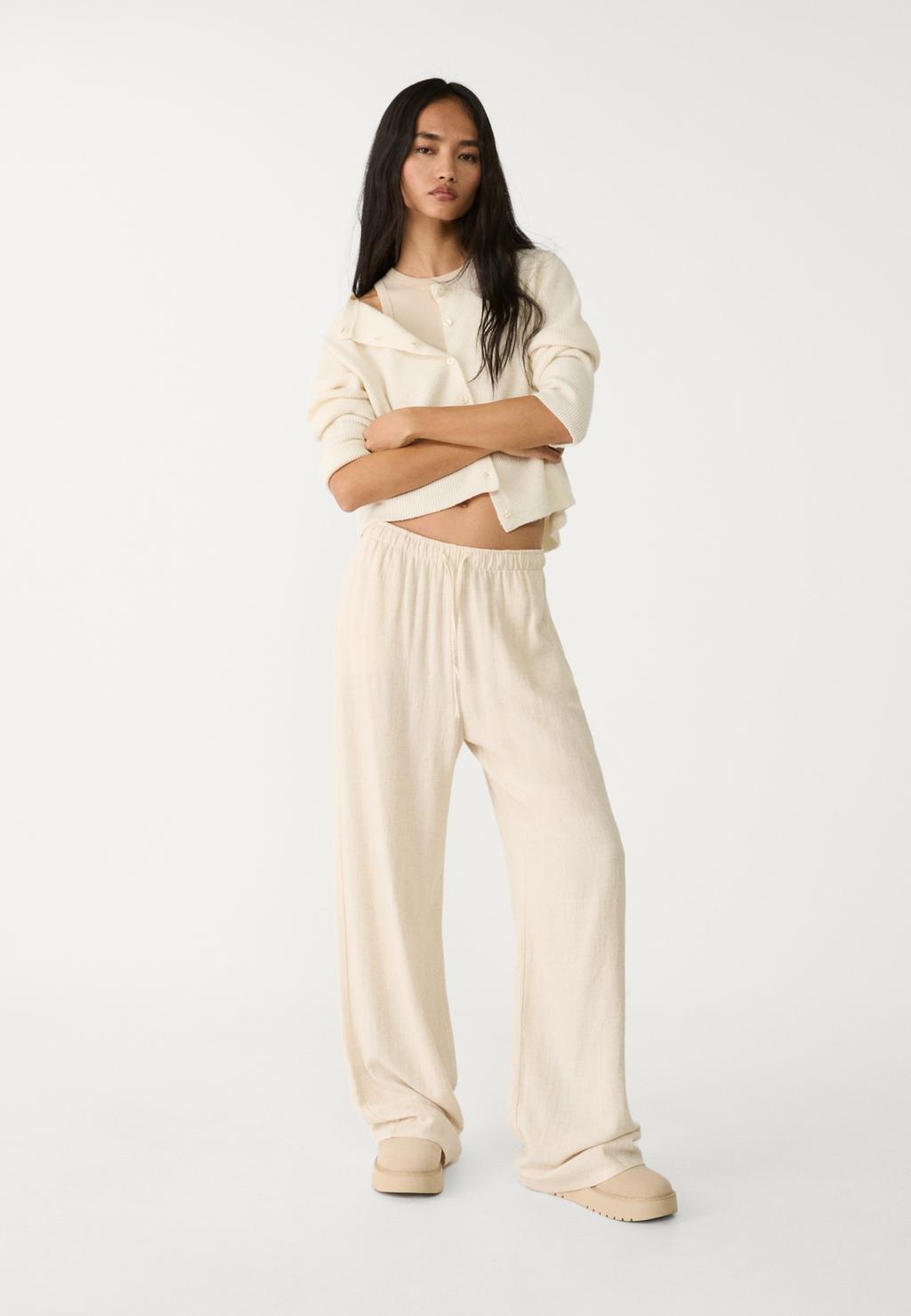 Loose-fitting linen blend trousers