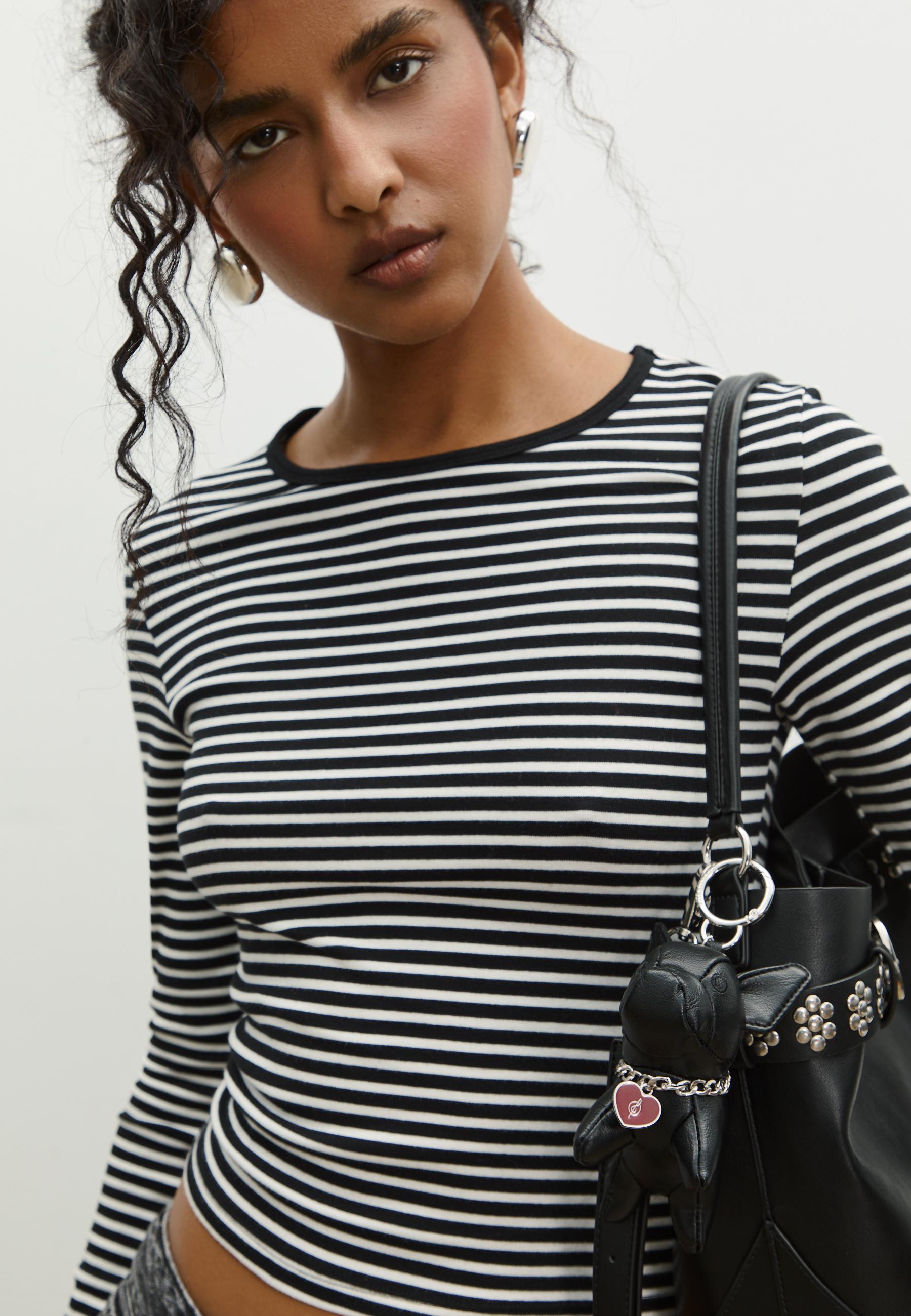 Dog charm keyring with a leather effect - Women's fashion