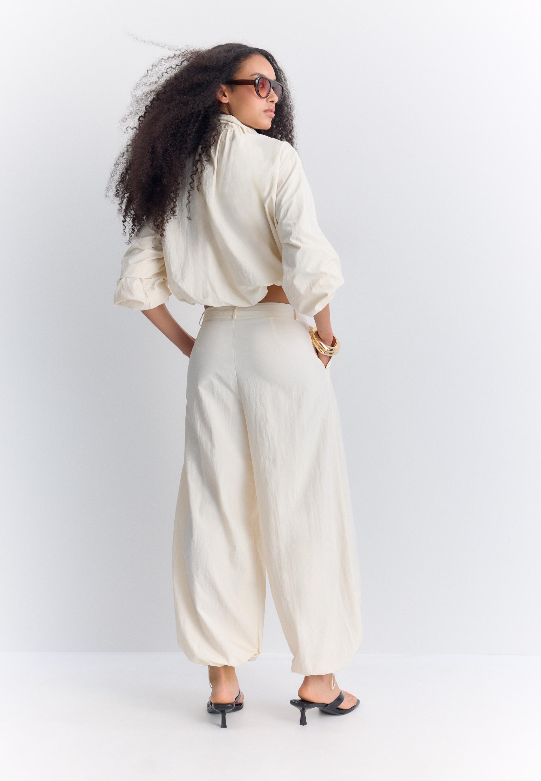 Darted technical sarouel trousers — Ecru