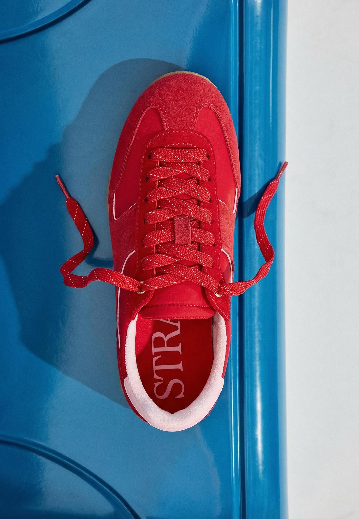 Flat sole trainers with leather details — RED 