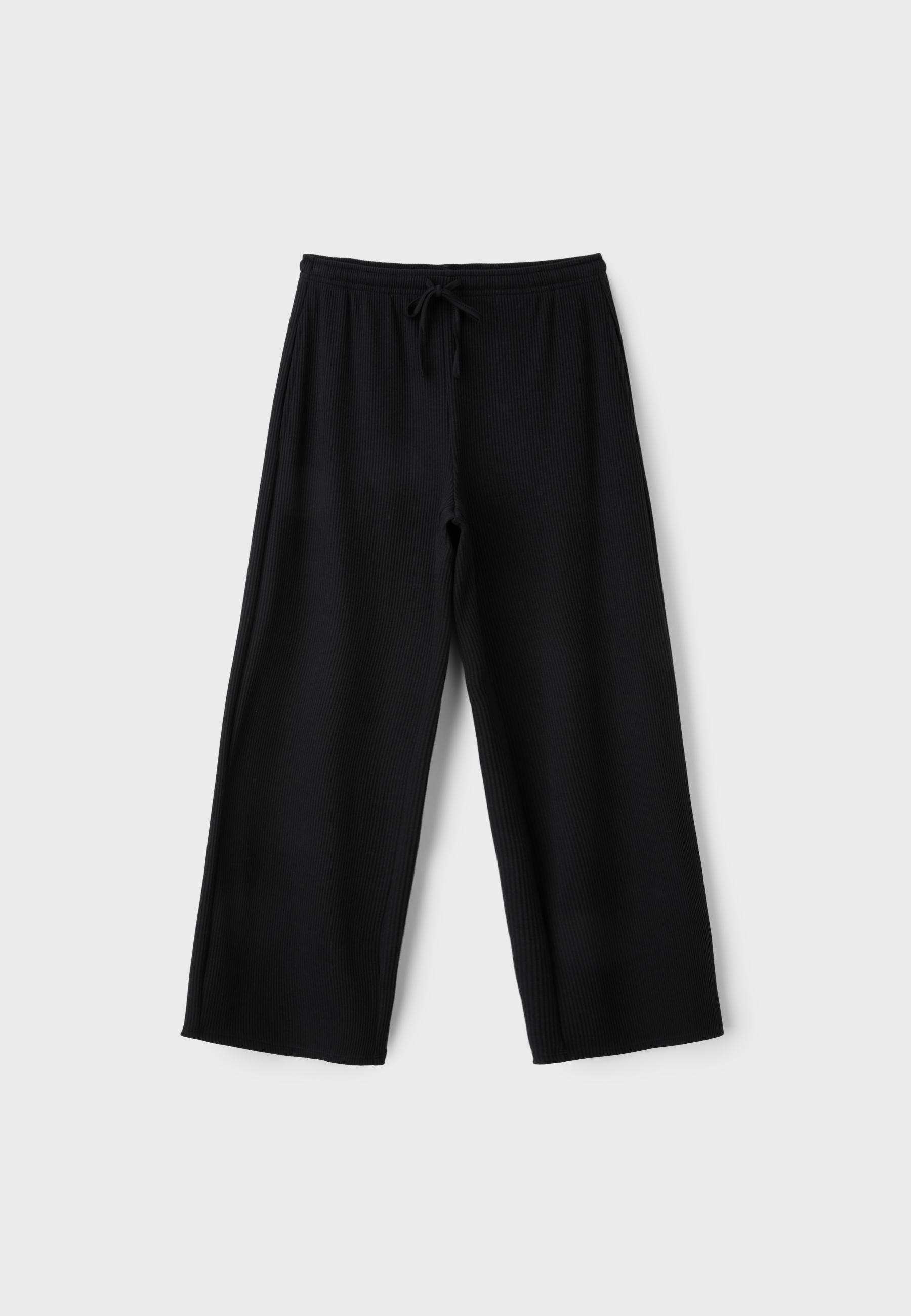 Soft-touch ribbed trousers — Black