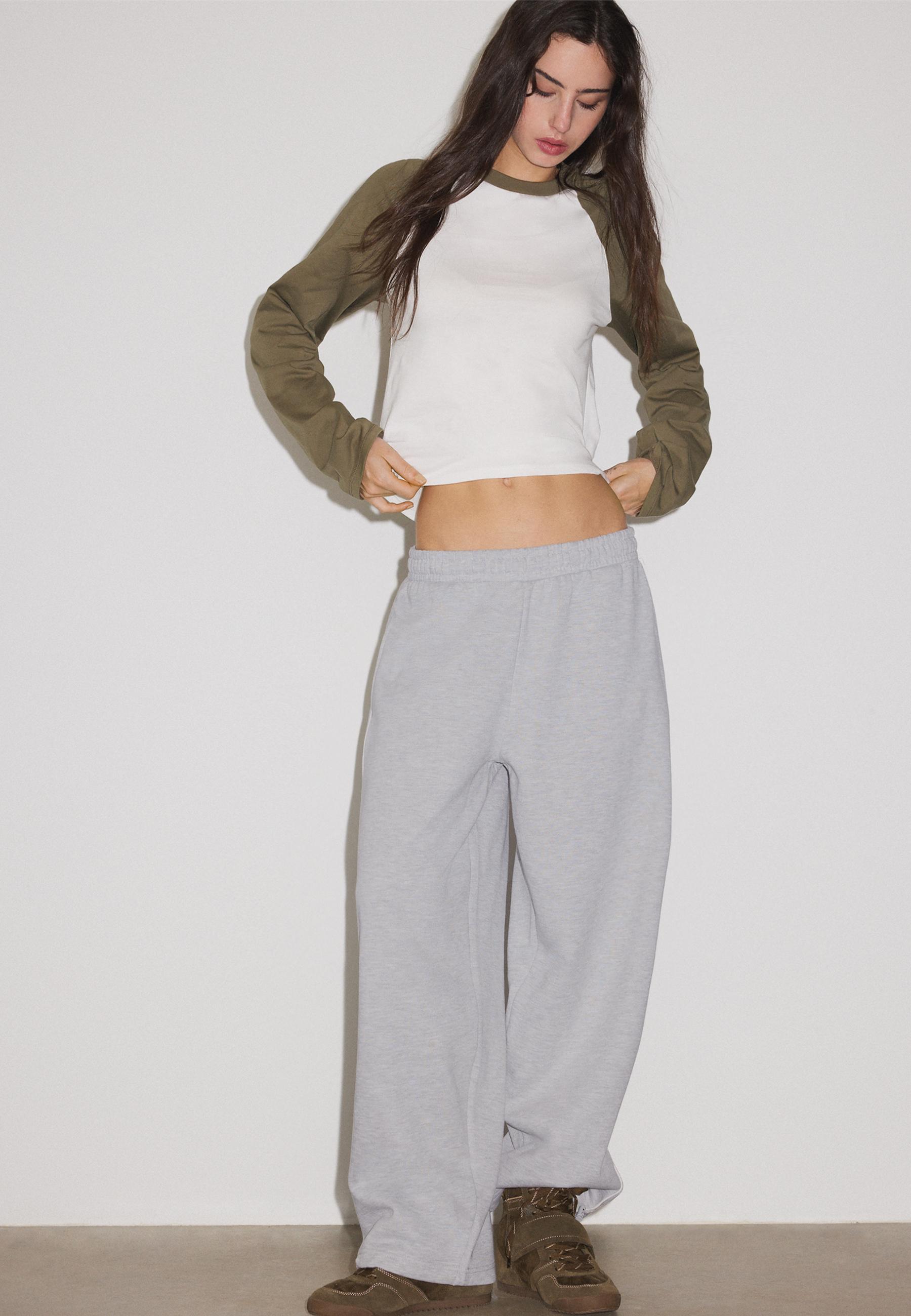 Plush joggers with piping and toggles — Grey melange