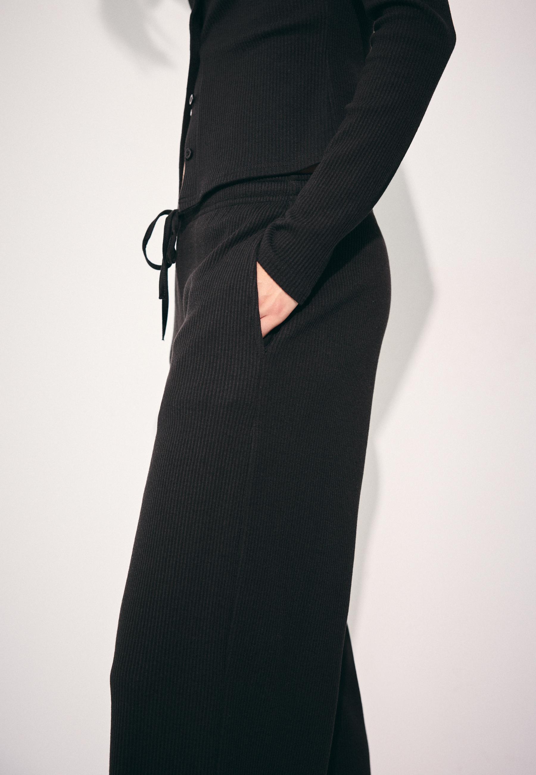 Soft-touch ribbed trousers — Black