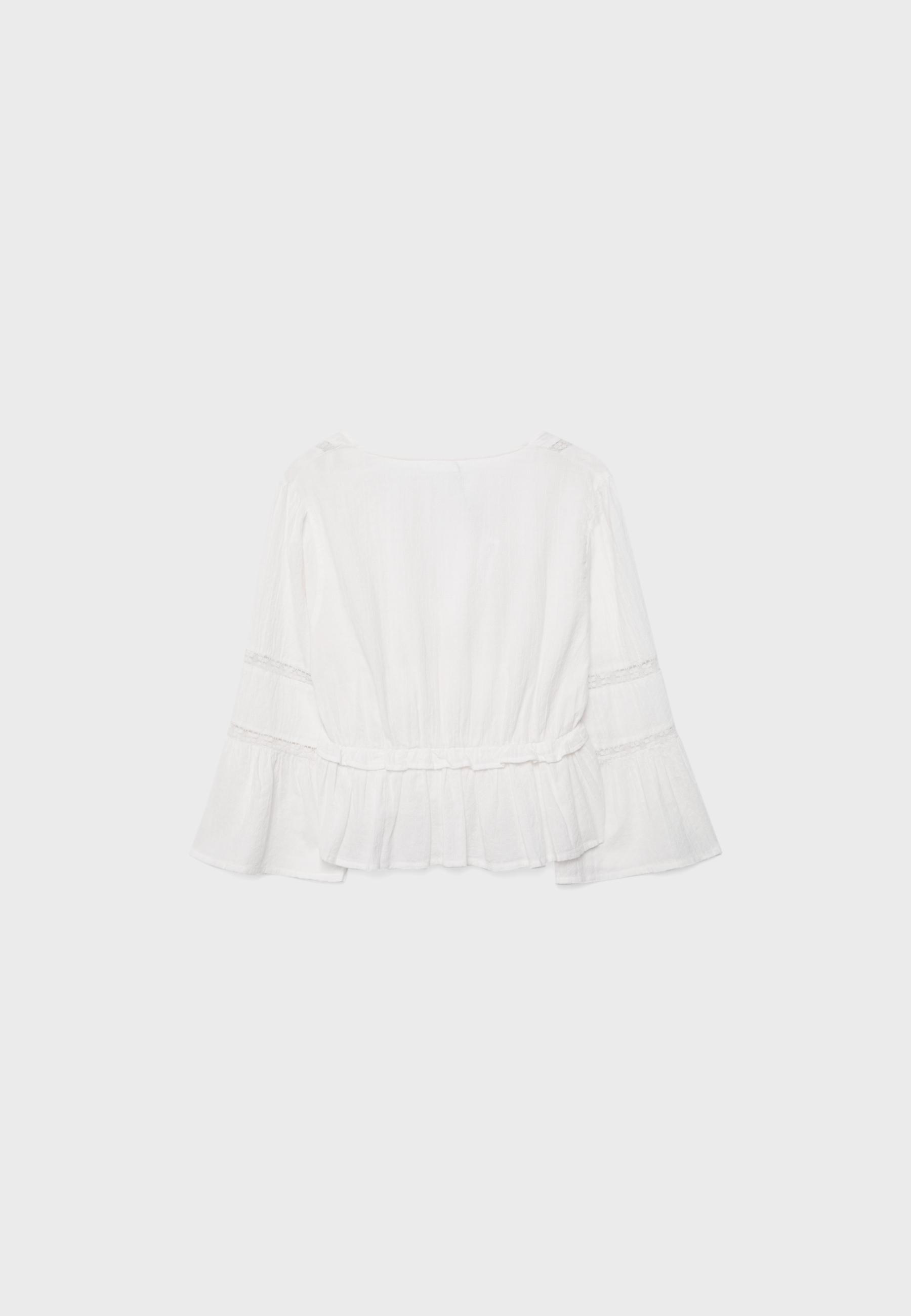 Peplum blouse with ruffles — White