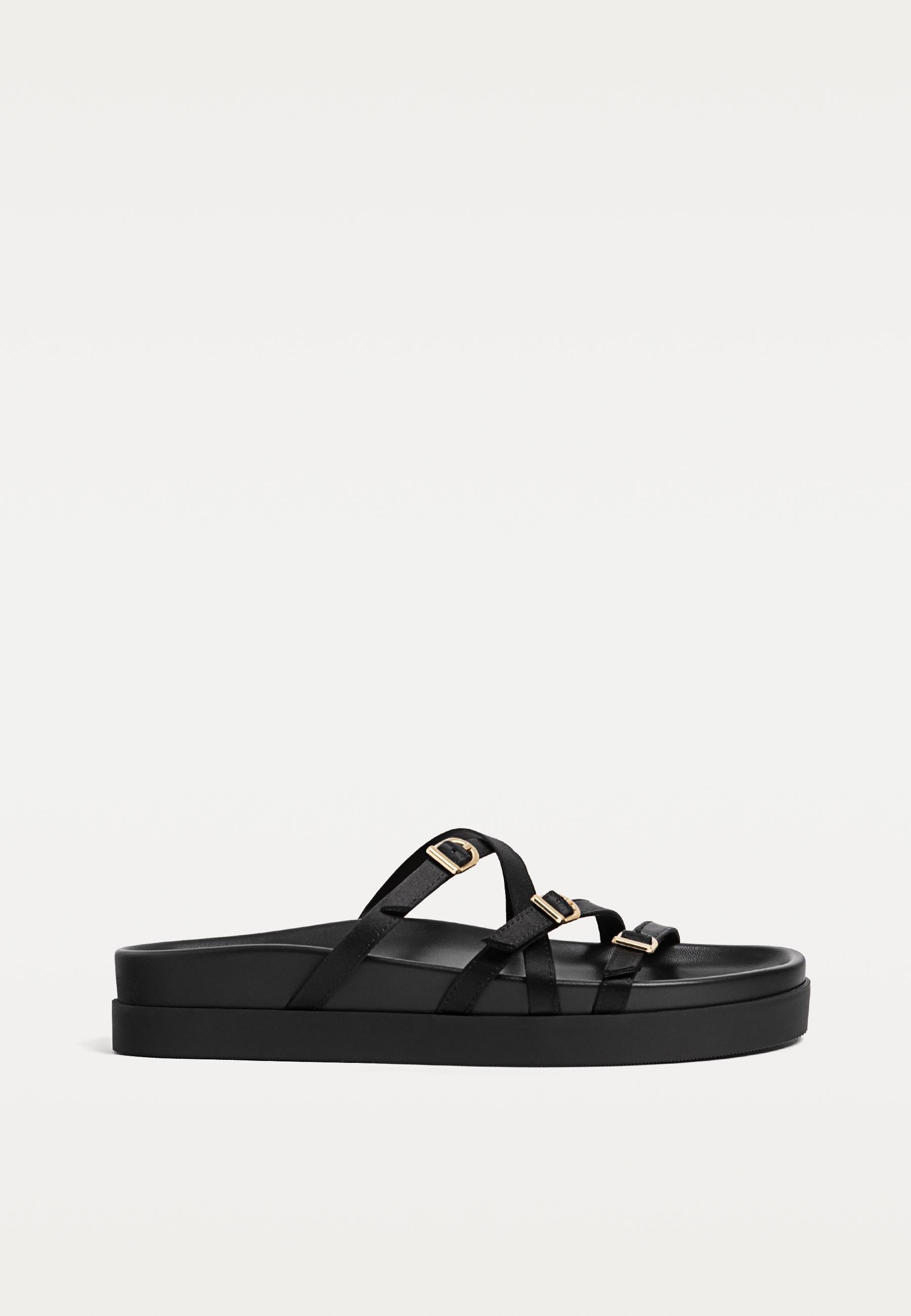Flat sandals with buckles - Women's fashion | Stradivarius Flat sandals with buckles - Women's fashion | Stradivarius