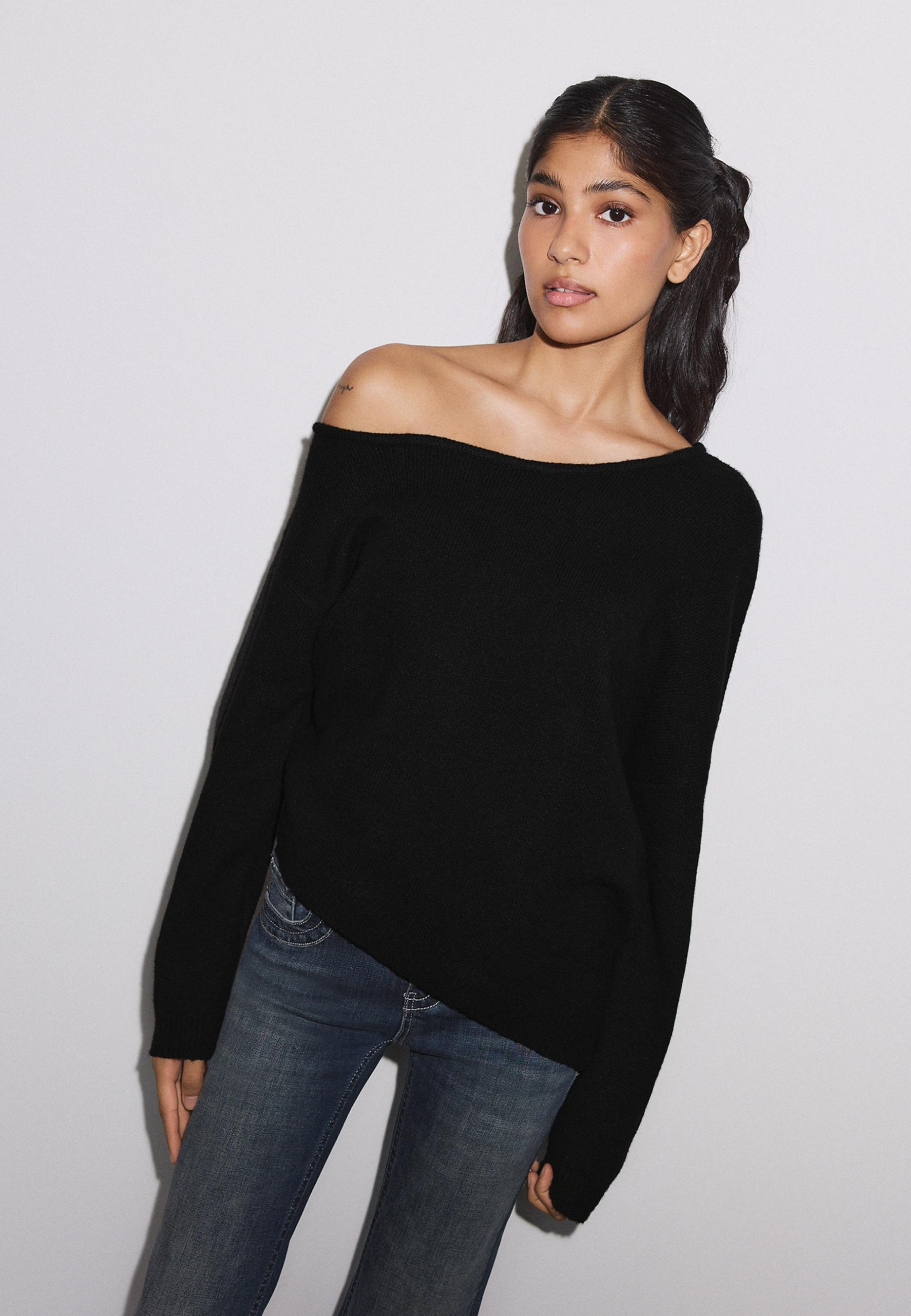 Asymmetric knit sweater — Black
