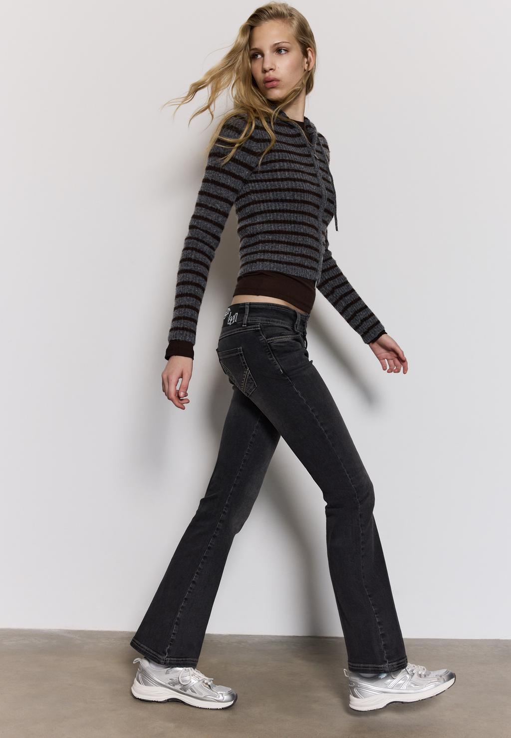 Jeans bootcut fit lage taille studs