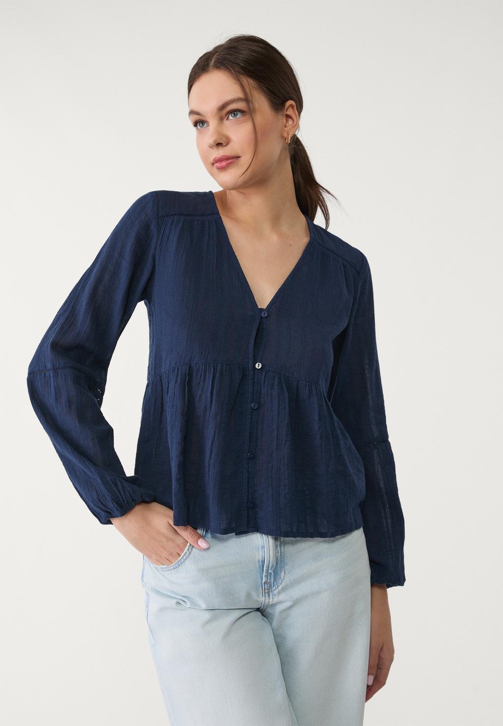 Flowing blouse with lace trims