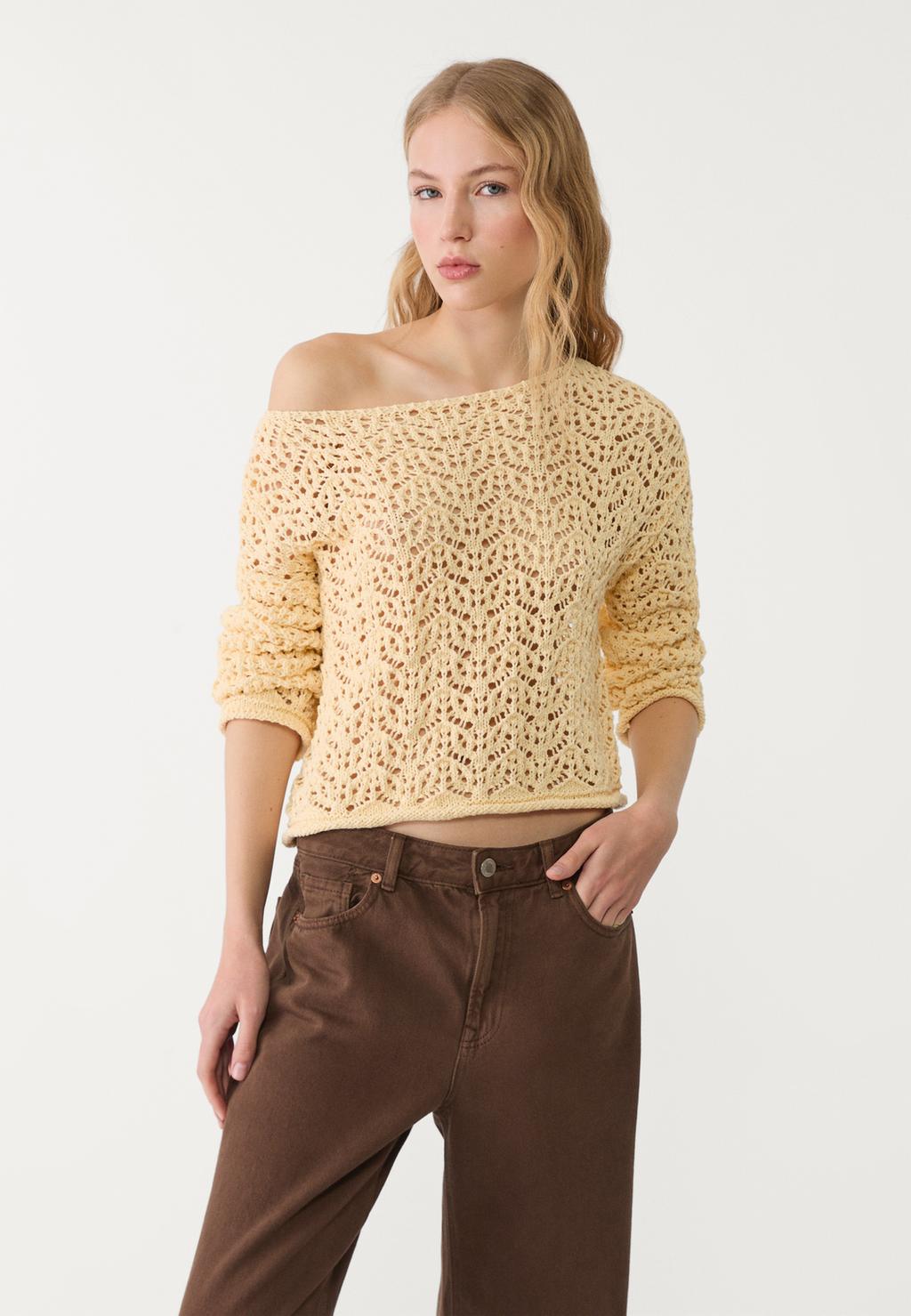 Open-knit sweater with a boat neck