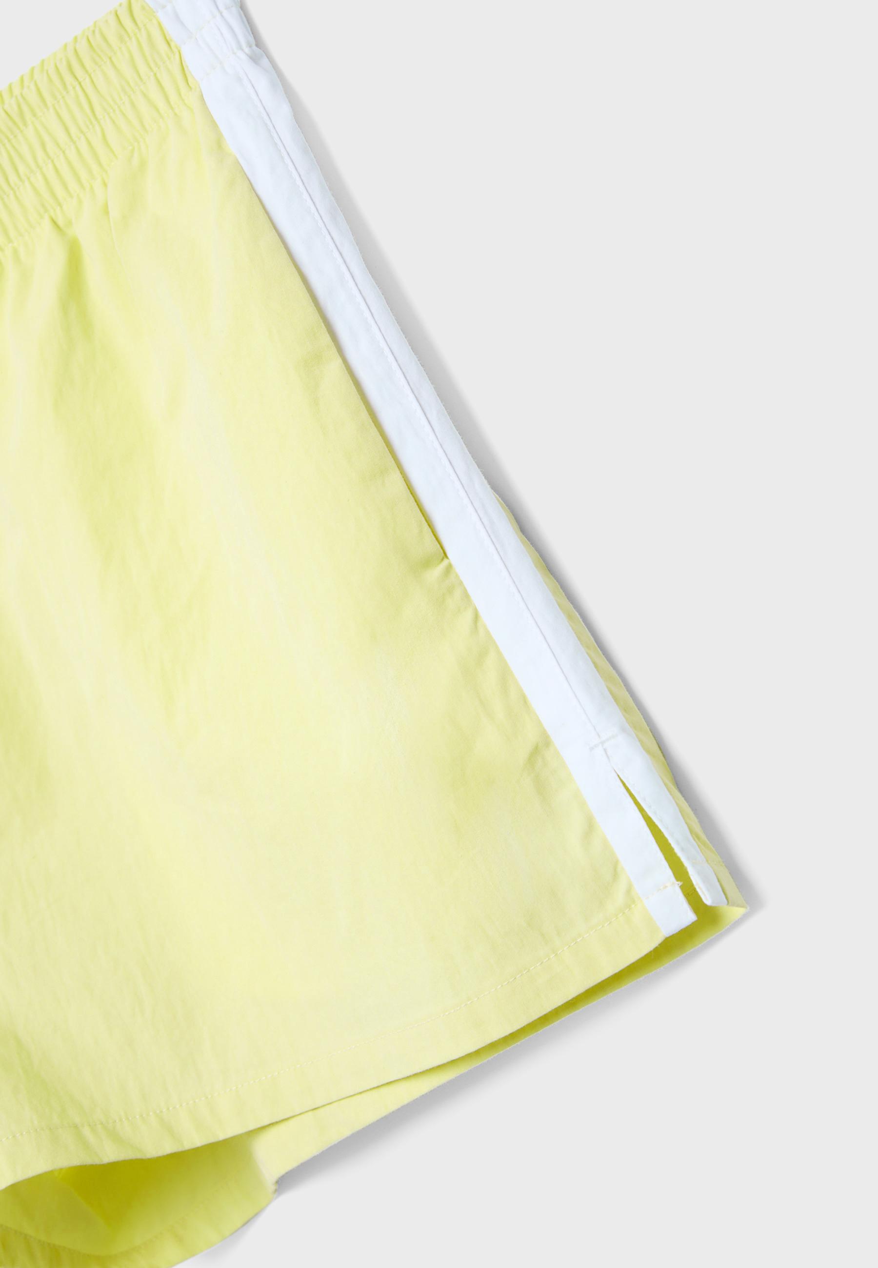 Technical shorts with side stripe — Pastel yellow
