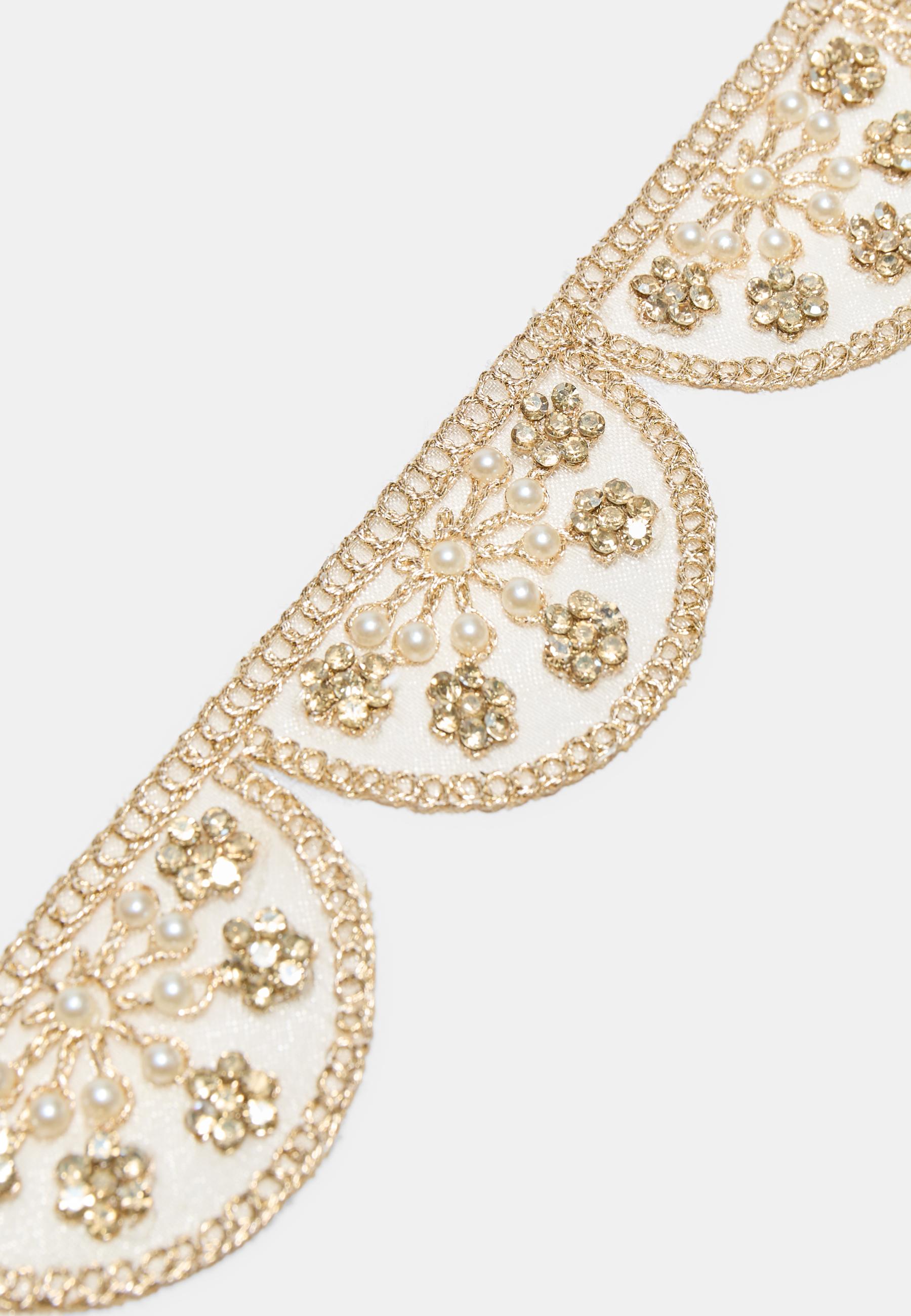 Wavy faux pearl belt — Ecru