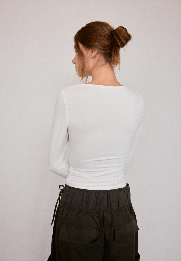 Long sleeve lace V-neck top — Ecru