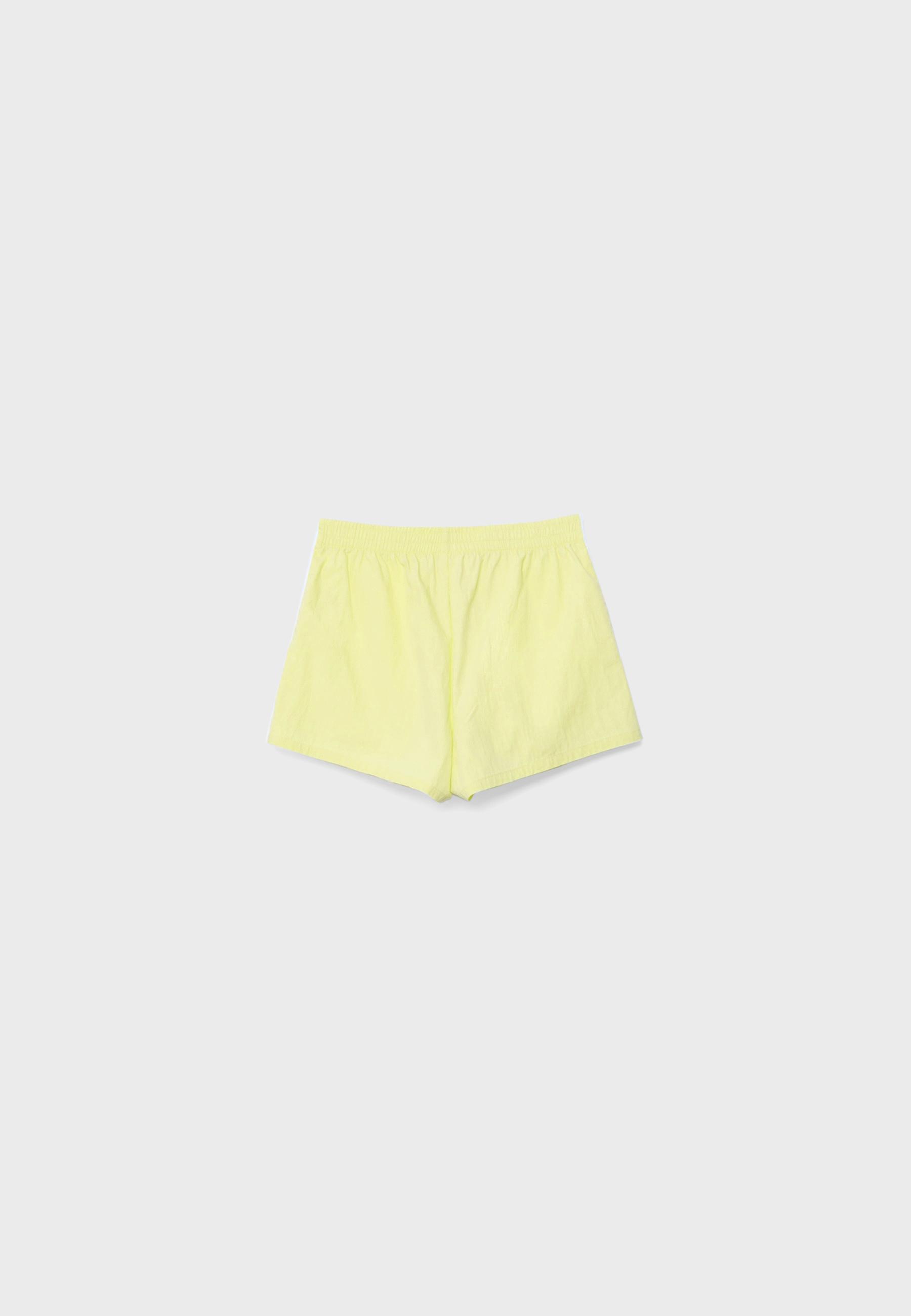 Technical shorts with side stripe — Pastel yellow