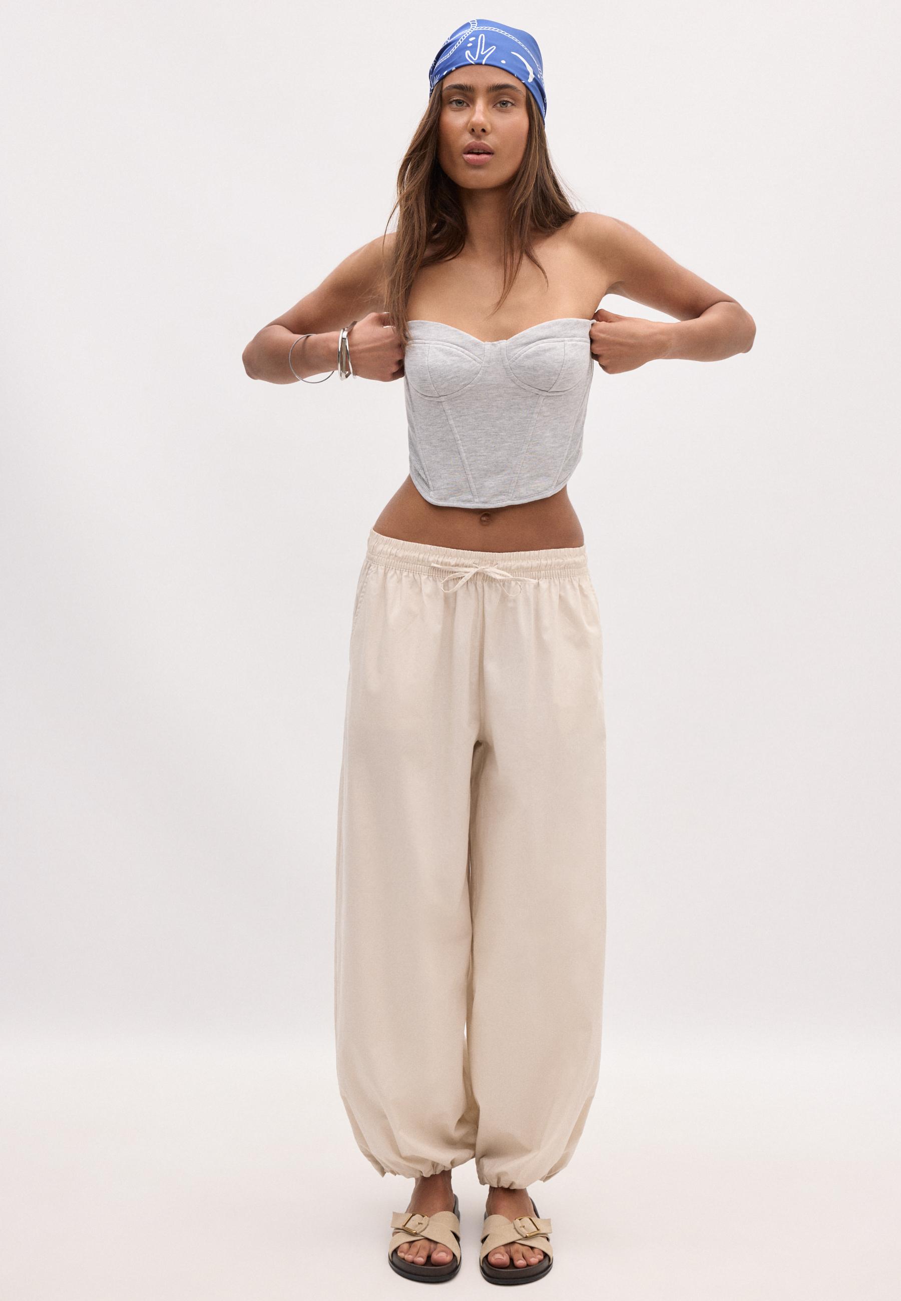 Balloon poplin trousers with stoppers — Stone