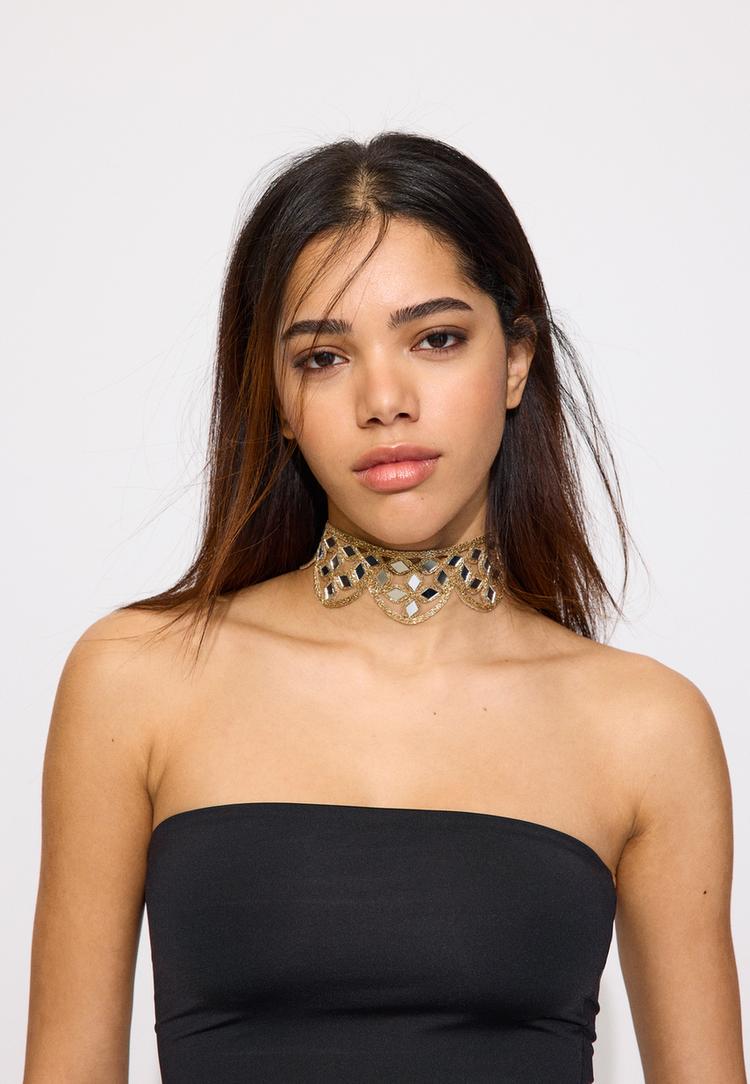 Stradivarius Τσόκερ Με Καθρέφτες Και Κυματισμούς Χρυσαφί Os φωτογραφία