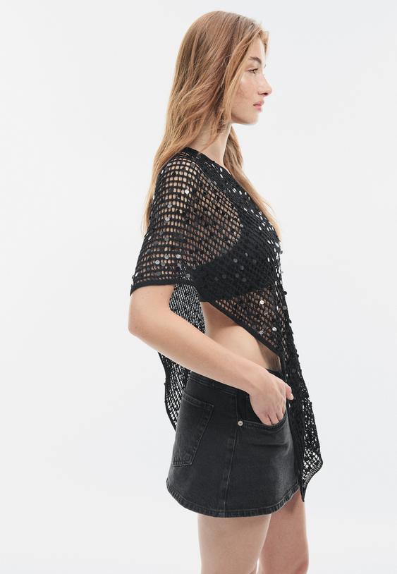 cape en maille a paillettes