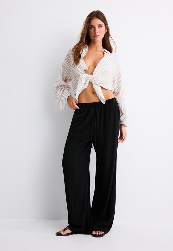 pantaloni fluidi effetto lino