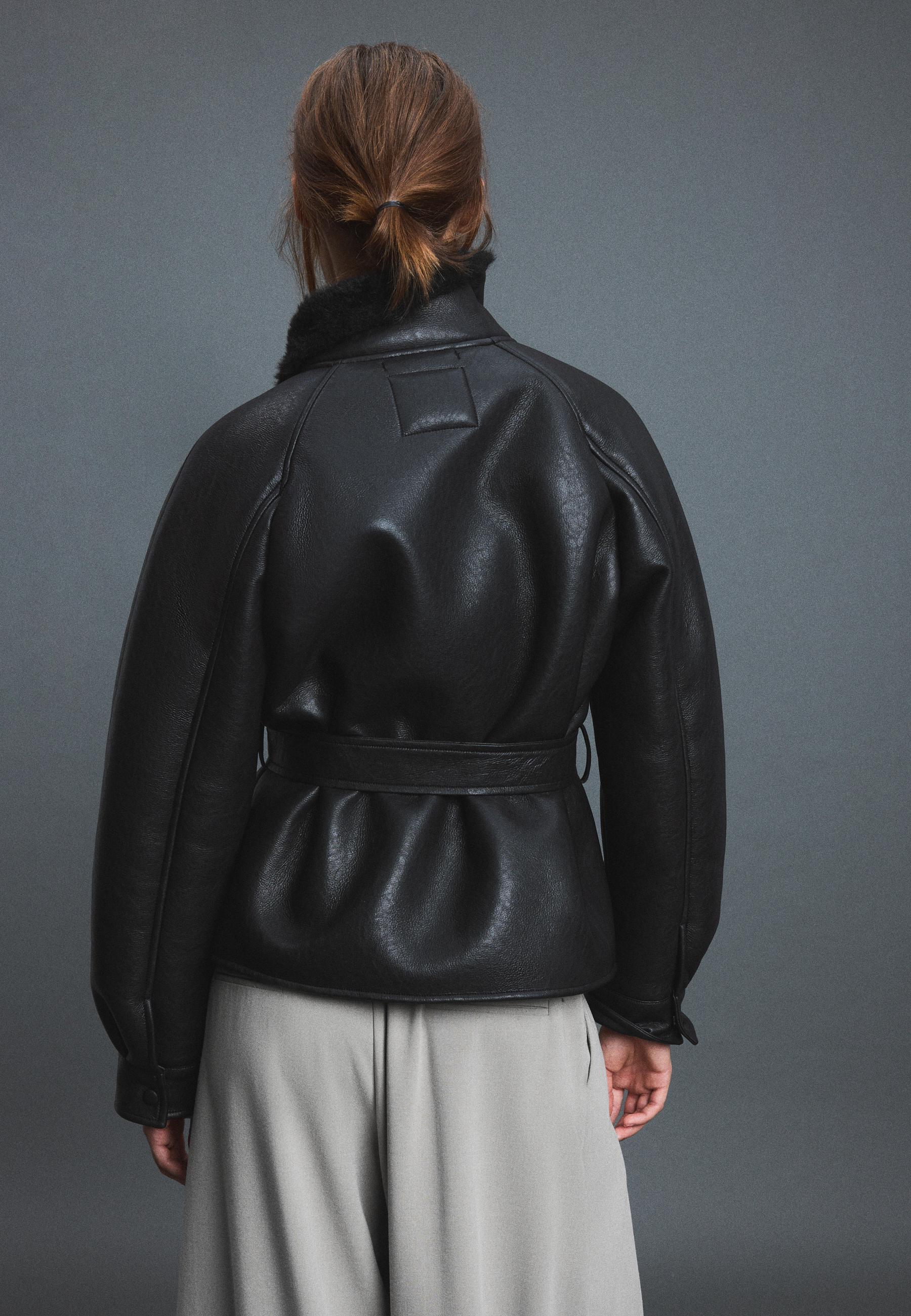 Leather effect double-faced high neck jacket — Black